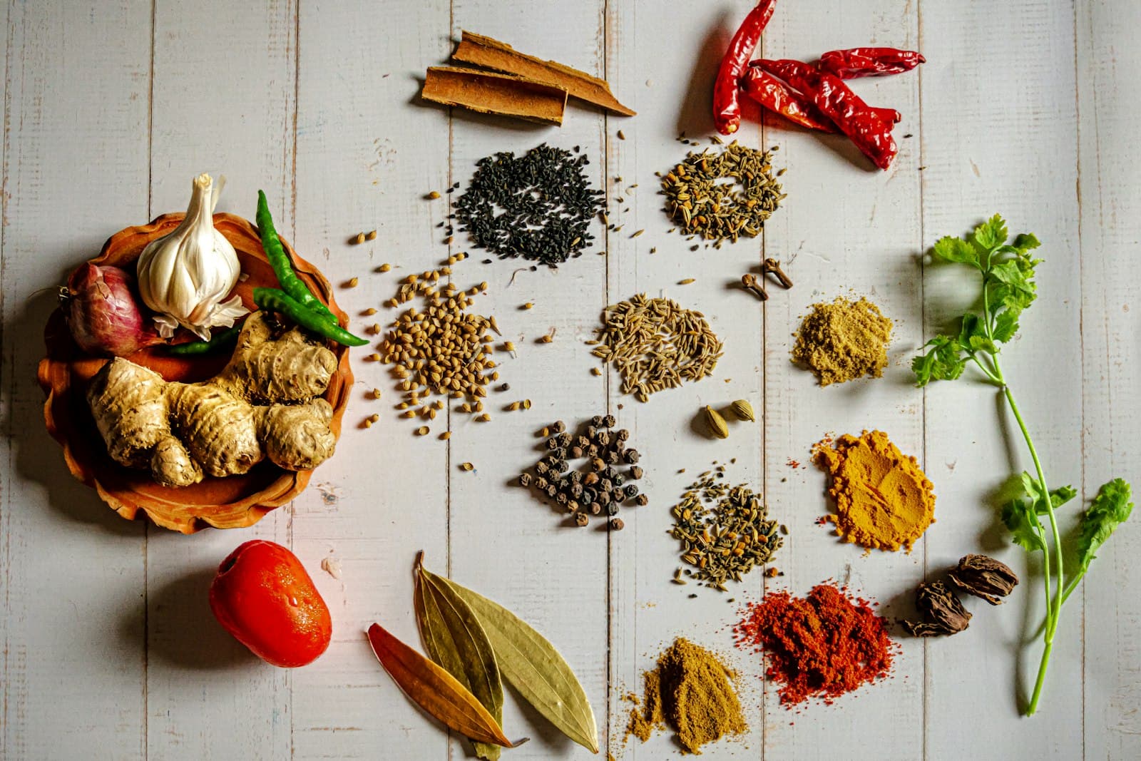 Bowls of red and brown ground spices
